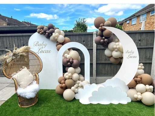 Crescent moon stand used as baby shower backdrop