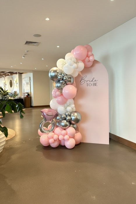 Custom arch backdrop with 9ft balloon garland